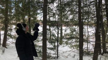 Picture of Jillian Trujilo recording nature sounds